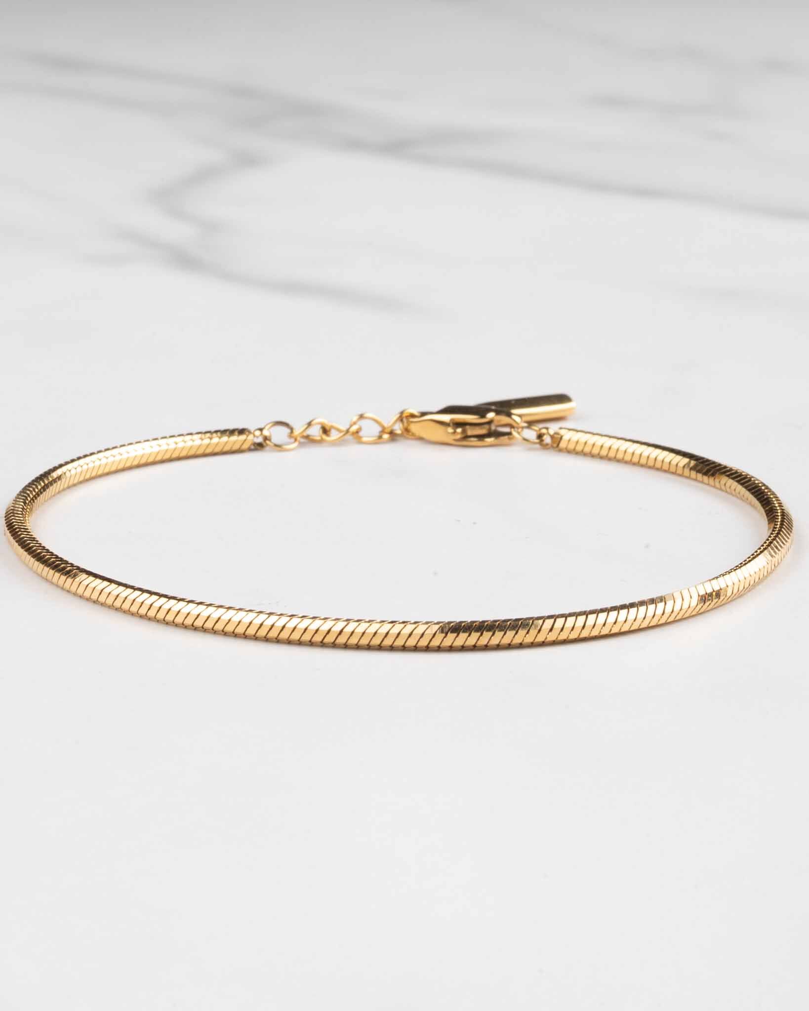 Hebi armband guld
